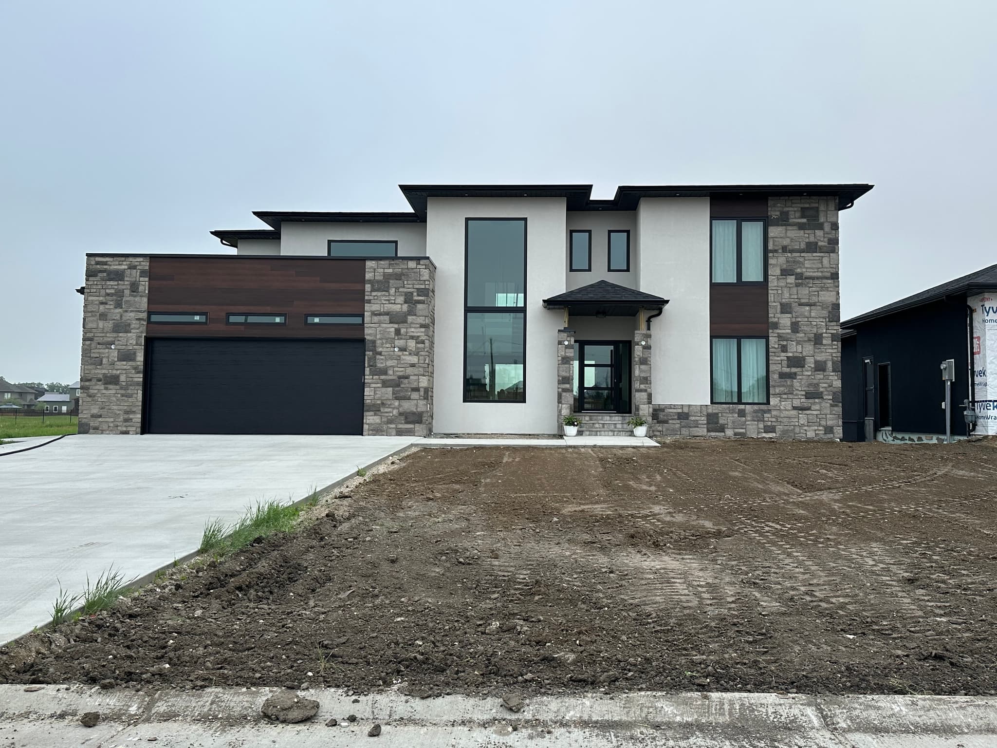 Contemporary Stone & Stucco Design
